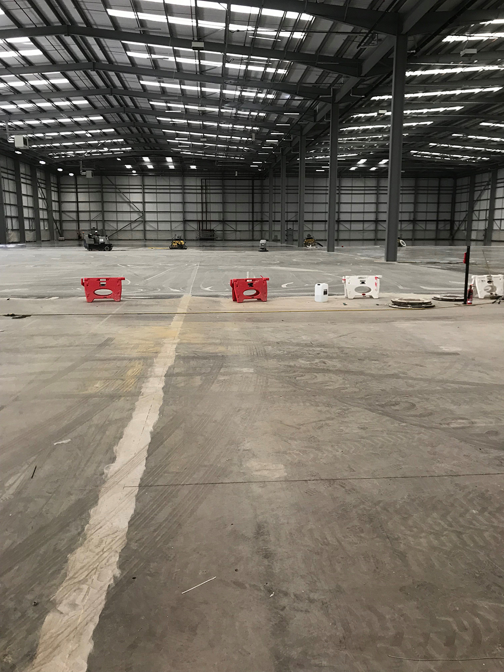 Warehouse concrete floor slab in Stafford is renovated and revitalised by Level Best Concrete